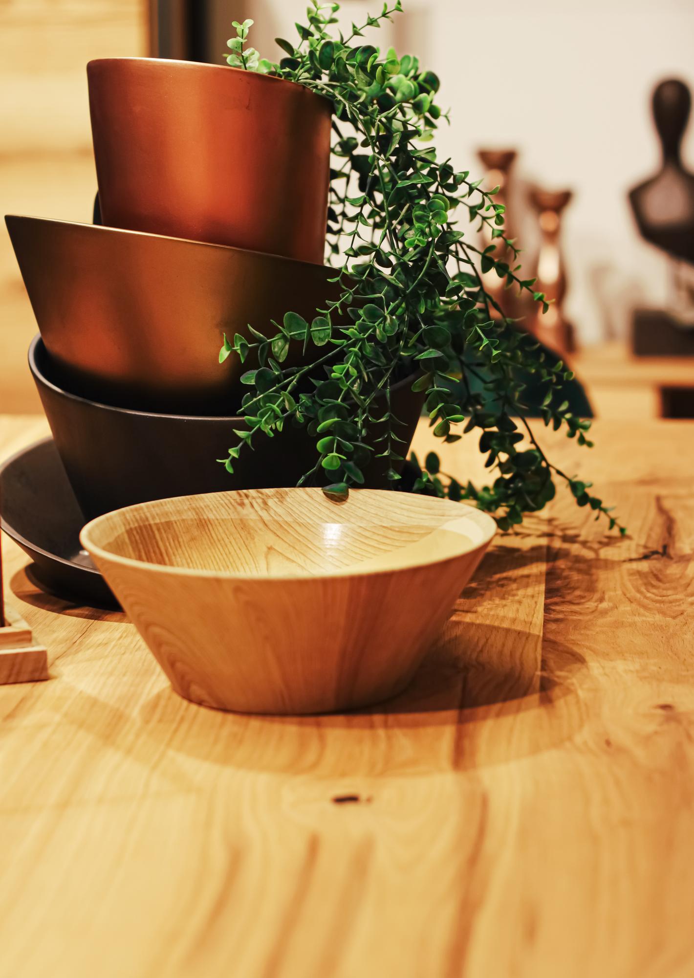 Stack of ceramic bowls with herbs